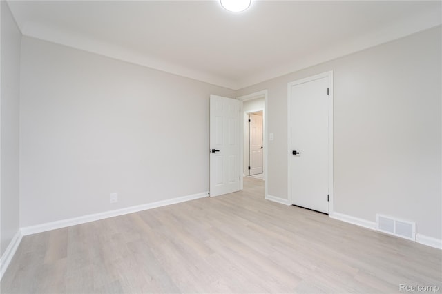 15648 Stricker Ave, Sterling Heights, MI 48021 - spare room featuring light wood finished floors and baseboards