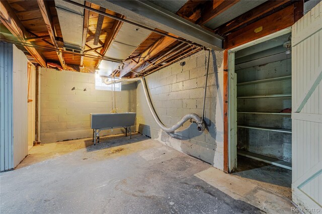 15648 Stricker Ave, Sterling Heights, MI 48021 - unfinished basement with a sink