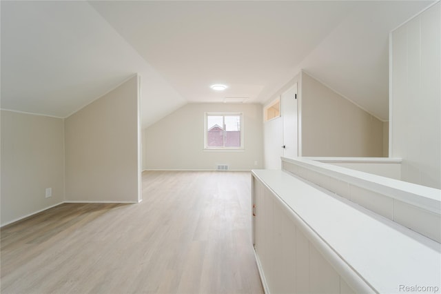 15648 Stricker Ave, Sterling Heights, MI 48021 - additional living space with light wood-style floors and lofted ceiling