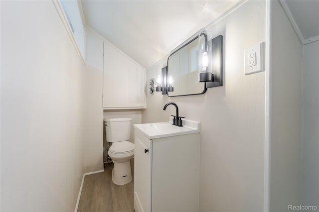 15648 Stricker Ave, Sterling Heights, MI 48021 - bathroom with wood finished floors and vanity