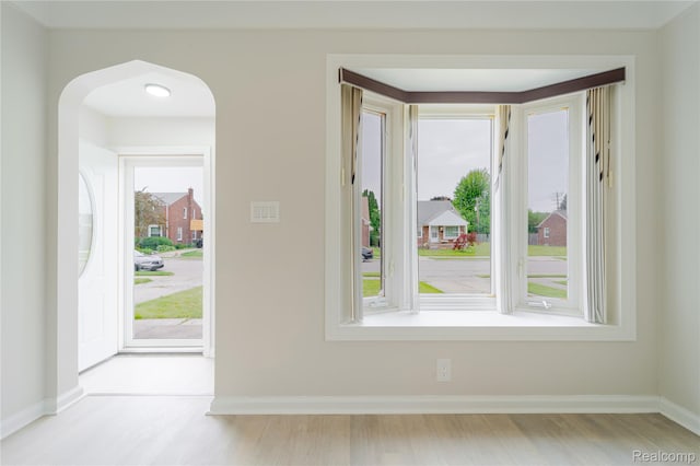 15648 Stricker Ave, Sterling Heights, MI 48021 - entrance foyer with wood finished floors and arched walkways