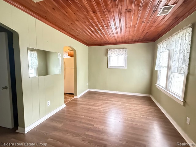 1149 E Milton Ave, Hazel Park, MI 48030 - unfurnished room featuring arched walkways, wood ceiling, crown molding, and wood finished floors