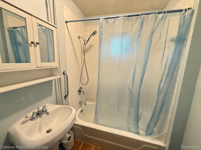1149 E Milton Ave, Hazel Park, MI 48030 - full bathroom with shower / bath combo and wood finished floors