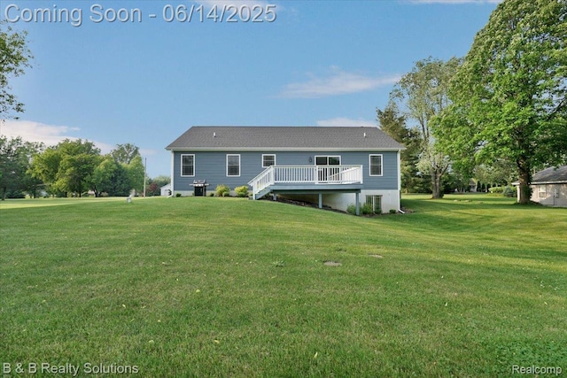 453 Angle Rd, Lapeer, MI 48446 - back of house with a wooden deck and a lawn
