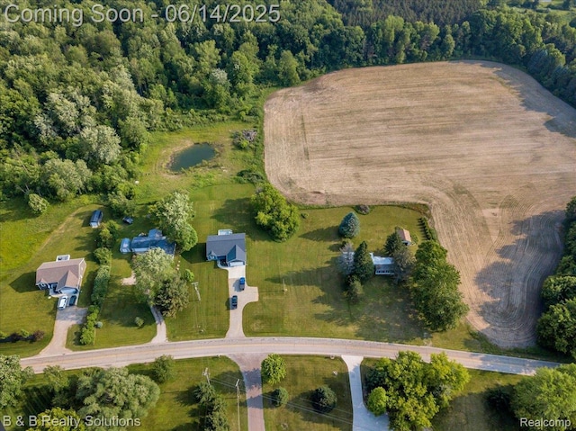 453 Angle Rd, Lapeer, MI 48446 - aerial view of property's location with a heavily wooded area