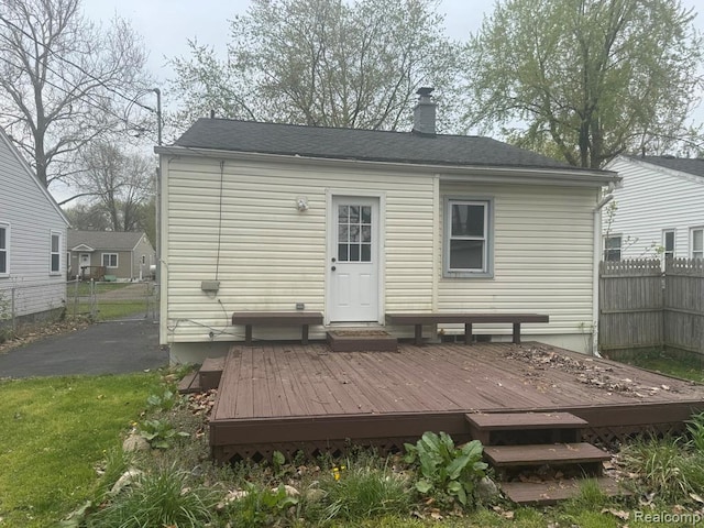248 W Longfellow Ave, Pontiac, MI 48340 - rear view of house with a chimney and a deck