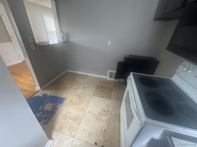 248 W Longfellow Ave, Pontiac, MI 48340 - kitchen with range and baseboards
