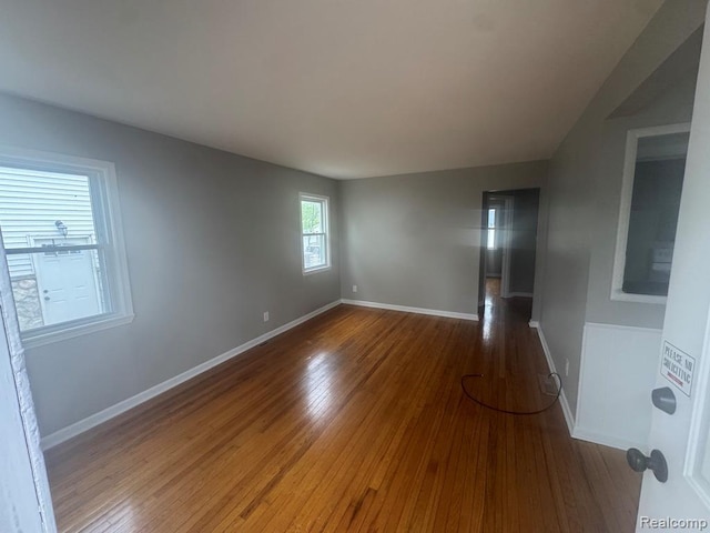 248 W Longfellow Ave, Pontiac, MI 48340 - spare room featuring wood finished floors and baseboards