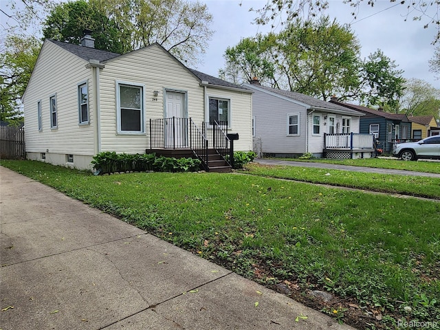 248 W Longfellow Ave, Pontiac, MI 48340 - view of front of property featuring a chimney and a front lawn