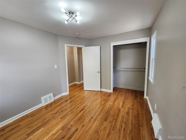 248 W Longfellow Ave, Pontiac, MI 48340 - unfurnished bedroom with a closet and light wood finished floors