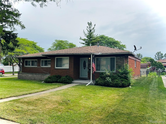 26046 Eureka Dr, Warren, MI 48091 - view of front of house featuring brick siding and a shingled roof