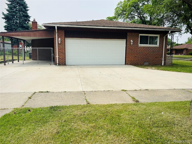 26046 Eureka Dr, Warren, MI 48091 - view of side of property featuring driveway, an attached garage, brick siding, and a carport