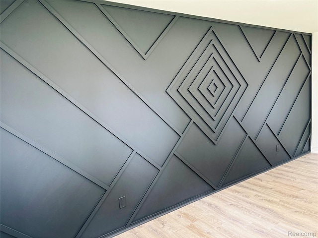 26046 Eureka Dr, Warren, MI 48091 - detailed view of wood finished floors and a decorative wall