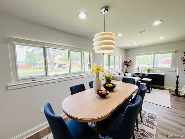 26046 Eureka Dr, Warren, MI 48091 - dining room with recessed lighting and wood finished floors