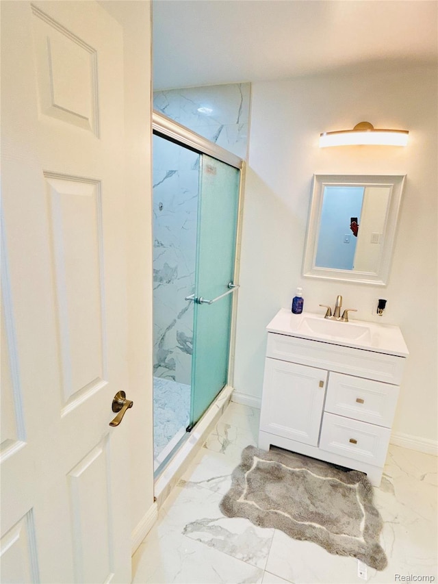 26046 Eureka Dr, Warren, MI 48091 - bathroom featuring marble look tiles, vanity, and a marble finish shower