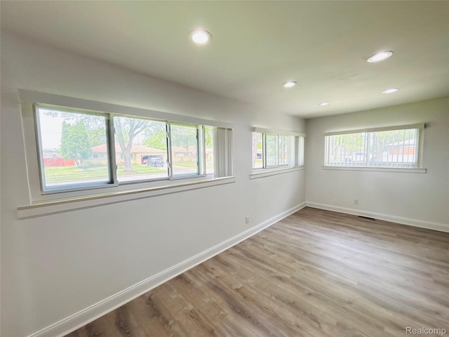 26046 Eureka Dr, Warren, MI 48091 - unfurnished room with recessed lighting and wood finished floors