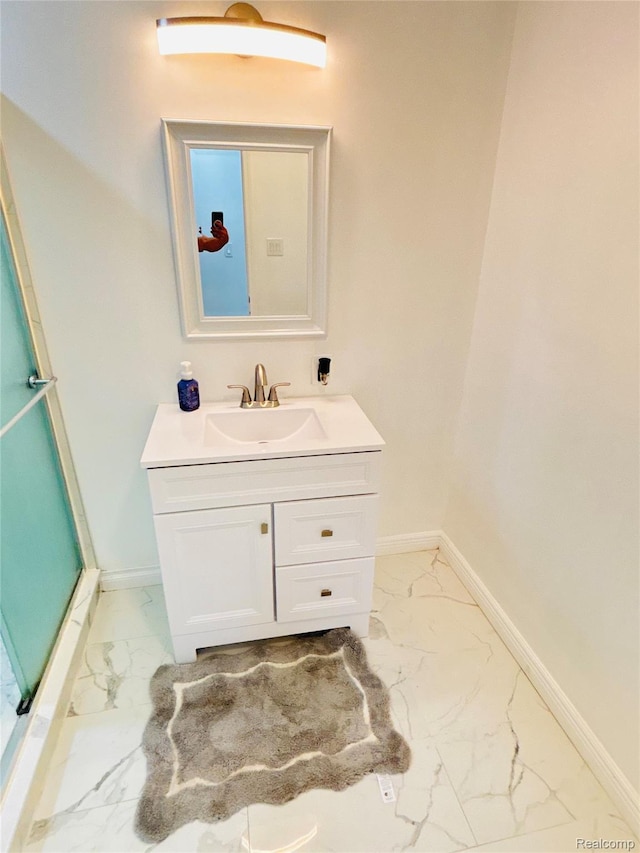 26046 Eureka Dr, Warren, MI 48091 - full bathroom featuring marble look tiles, vanity, and a shower stall