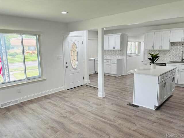 26046 Eureka Dr, Warren, MI 48091 - entryway with light wood-type flooring and recessed lighting