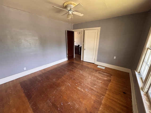 1407 Michigan Ave, Alma, MI 48801 - unfurnished room with a ceiling fan and wood-type flooring