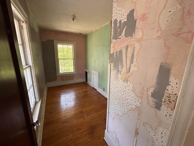1407 Michigan Ave, Alma, MI 48801 - unfurnished room featuring wood-type flooring and baseboards