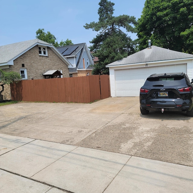 2356 SE Paris, Grand Rapids, MI 49507 - view of side of home featuring a garage