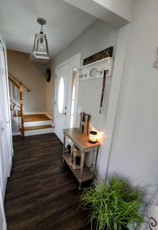 24825 Timber Ridge Trl, Flat Rock, MI 48134 - entrance foyer featuring dark wood finished floors and stairs