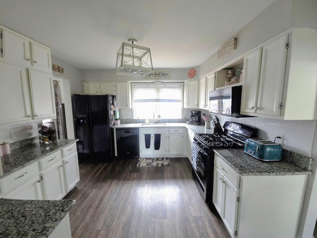 24825 Timber Ridge Trl, Flat Rock, MI 48134 - kitchen featuring black appliances, white cabinetry, light stone countertops, open shelves, and dark wood finished floors