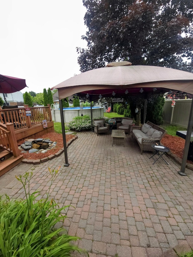 24825 Timber Ridge Trl, Flat Rock, MI 48134 - view of patio / terrace with a gazebo and an outdoor hangout area
