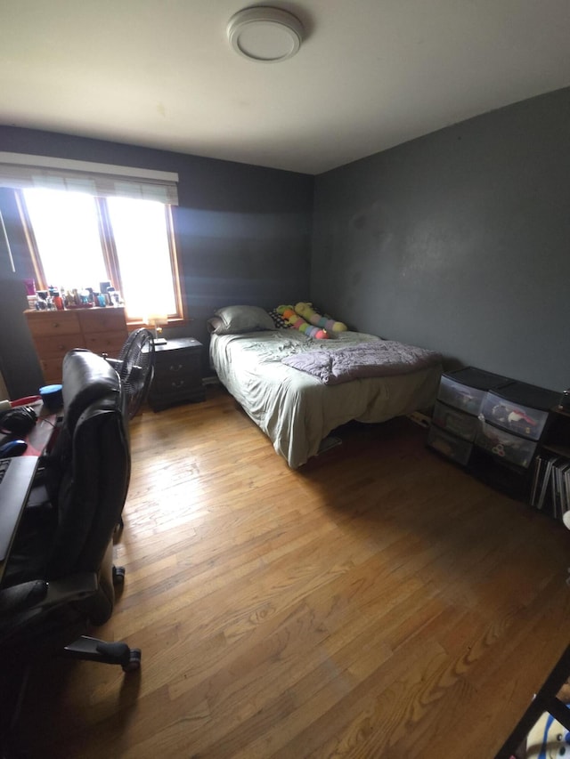 24825 Timber Ridge Trl, Flat Rock, MI 48134 - bedroom featuring wood finished floors and an office area