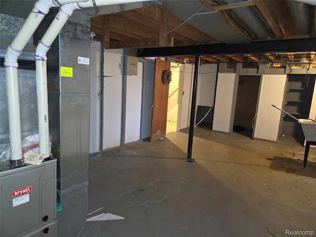 21450 Evergreen Rd, Southfield, MI 48075 - unfinished basement with heating unit