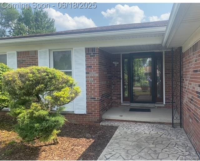 20329 Churchill Ave, Trenton, MI 48183 - doorway to property featuring brick siding