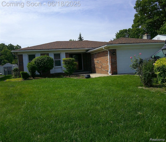 20329 Churchill Ave, Trenton, MI 48183 - single story home with brick siding, a garage, and a front yard