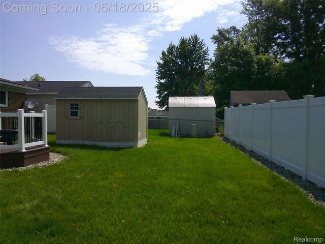 20329 Churchill Ave, Trenton, MI 48183 - view of yard featuring a storage shed and a wooden deck