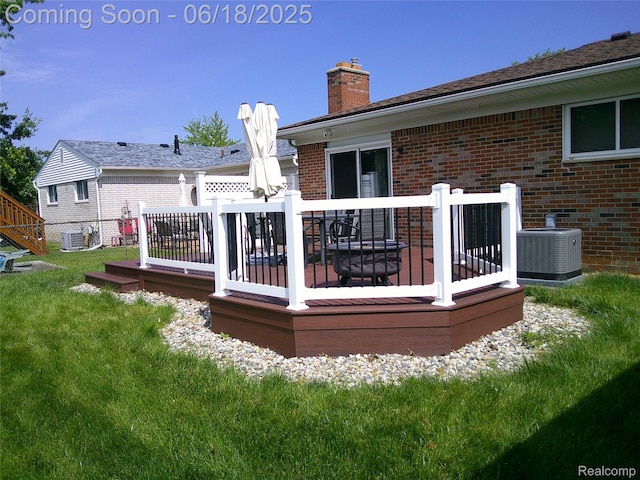 20329 Churchill Ave, Trenton, MI 48183 - back of house featuring brick siding, a wooden deck, a chimney, and a yard