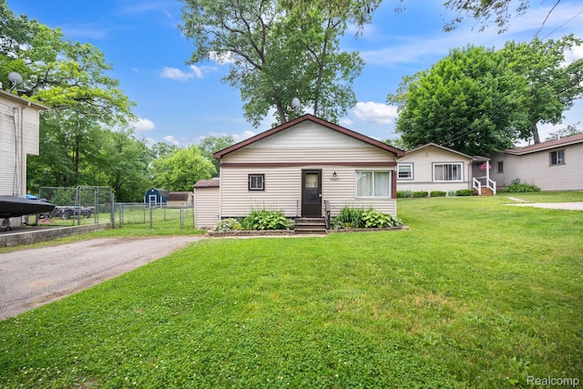 2263 Overridge Ave, Waterford, MI 48327 - view of front of home featuring driveway and a gate
