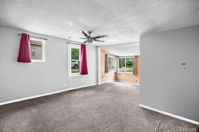 2263 Overridge Ave, Waterford, MI 48327 - carpeted spare room featuring a textured ceiling, ceiling fan, and healthy amount of natural light