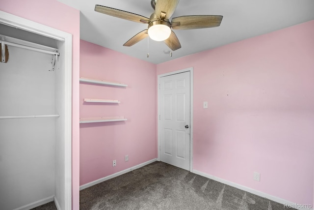 2263 Overridge Ave, Waterford, MI 48327 - unfurnished bedroom with carpet, ceiling fan, and a closet