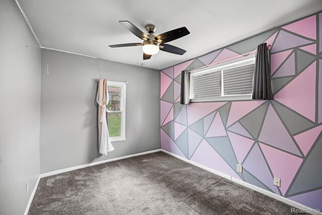2263 Overridge Ave, Waterford, MI 48327 - carpeted empty room featuring a ceiling fan and baseboards
