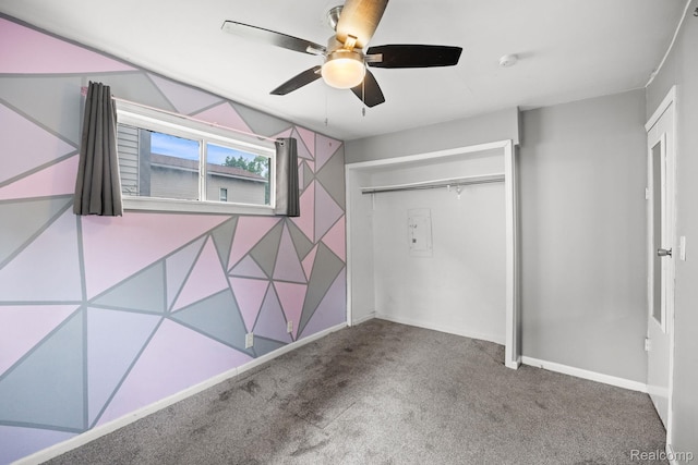2263 Overridge Ave, Waterford, MI 48327 - unfurnished bedroom with carpet floors, a ceiling fan, and a closet