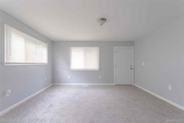 853 Melrose St, Pontiac, MI 48340 - carpeted spare room with baseboards