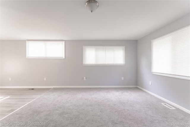 853 Melrose St, Pontiac, MI 48340 - spare room featuring baseboards and light colored carpet