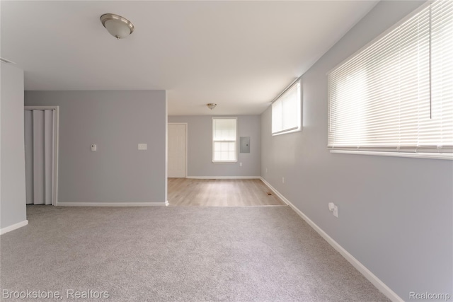 853 Melrose St, Pontiac, MI 48340 - empty room featuring light carpet and electric panel