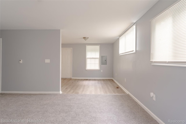 853 Melrose St, Pontiac, MI 48340 - empty room featuring electric panel and light colored carpet