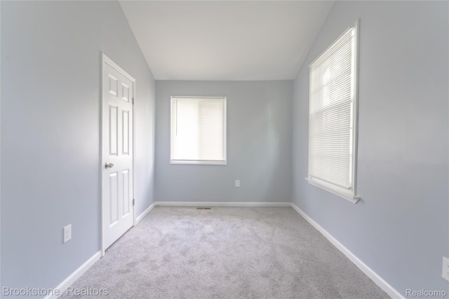 853 Melrose St, Pontiac, MI 48340 - unfurnished bedroom featuring carpet floors and vaulted ceiling