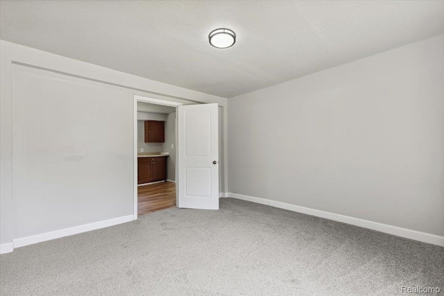 3140 Moore St, Inkster, MI 48141 - unfurnished bedroom featuring light colored carpet and baseboards