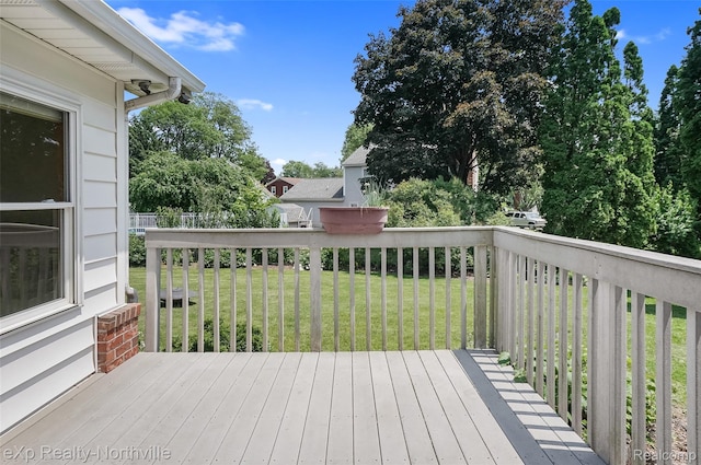 517 S Scott St, Adrian, MI 49221 - deck featuring a yard