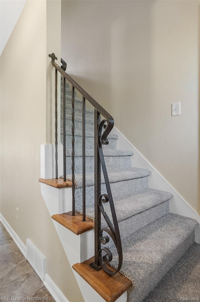 517 S Scott St, Adrian, MI 49221 - stairs with baseboards
