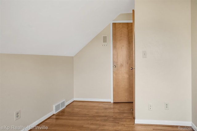 517 S Scott St, Adrian, MI 49221 - bonus room with lofted ceiling and wood finished floors