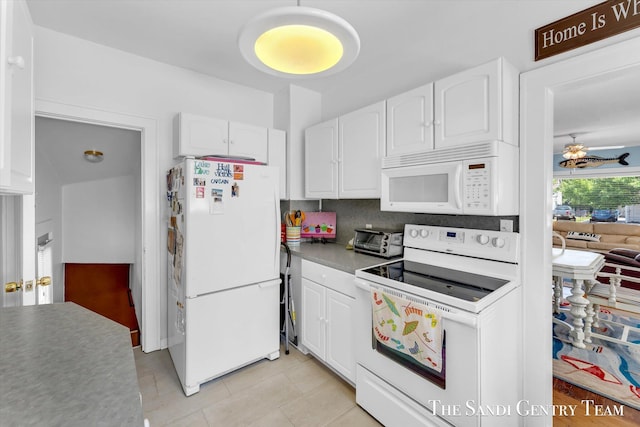 508 Fulton St, Grand Haven, MI 49417 - kitchen featuring white appliances, white cabinetry, tasteful backsplash, ceiling fan, and light tile patterned floors