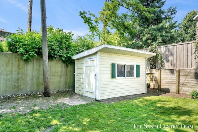 508 Fulton St, Grand Haven, MI 49417 - view of shed with a fenced backyard